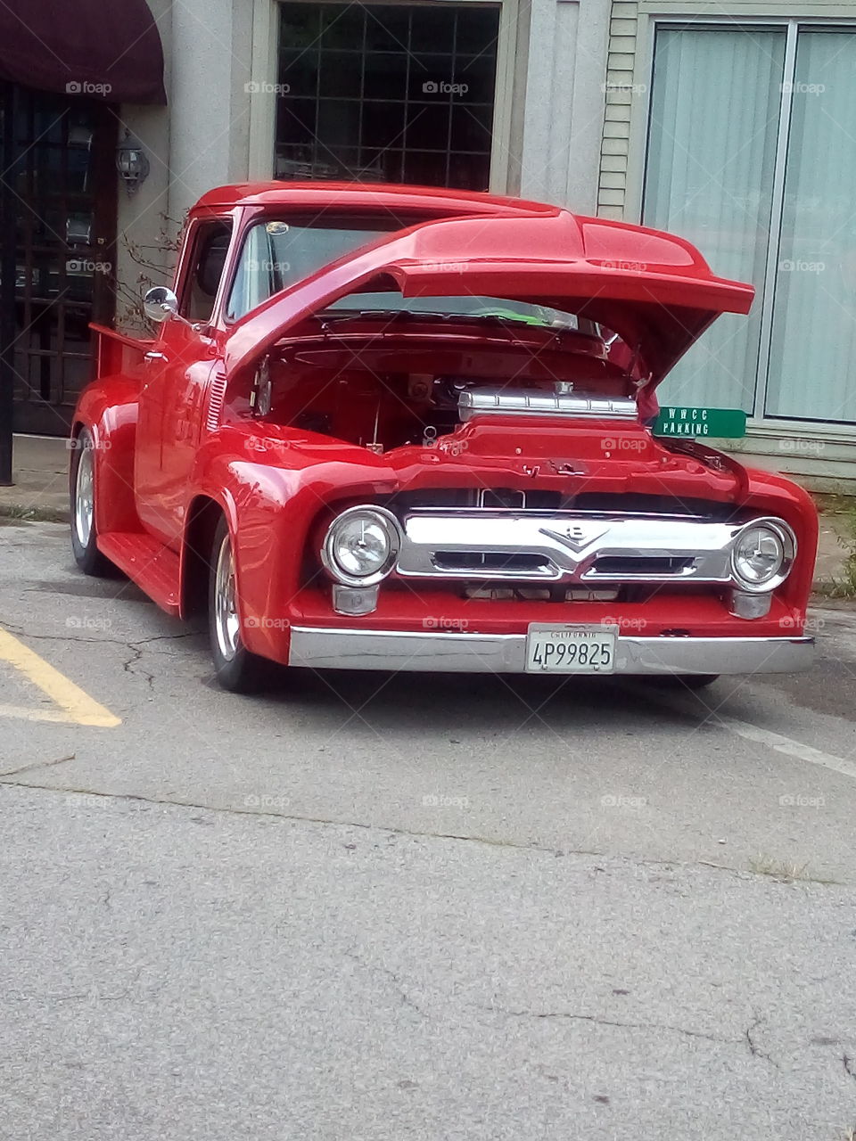 this is what summer is all about car shows! back when they built cars tough. red shiny truck