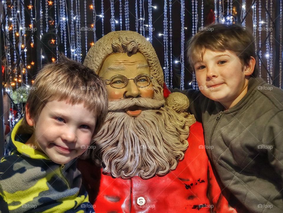 Boys With Santa Claus. Christmas Cheer
