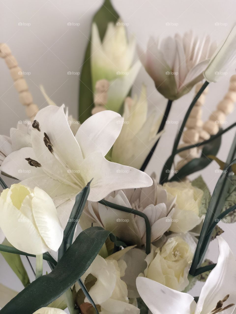 This beautiful arrangement of white flowers and leaves shows how lovely flowers can be!
