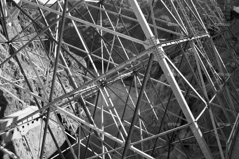 Building support grid. Photo taken at Hoover Dam.  Metal support bars for lines and patterns.  Black and white photo.