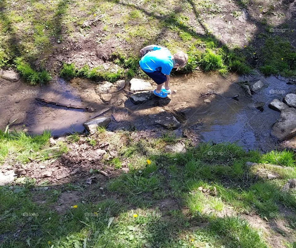 boy in creek