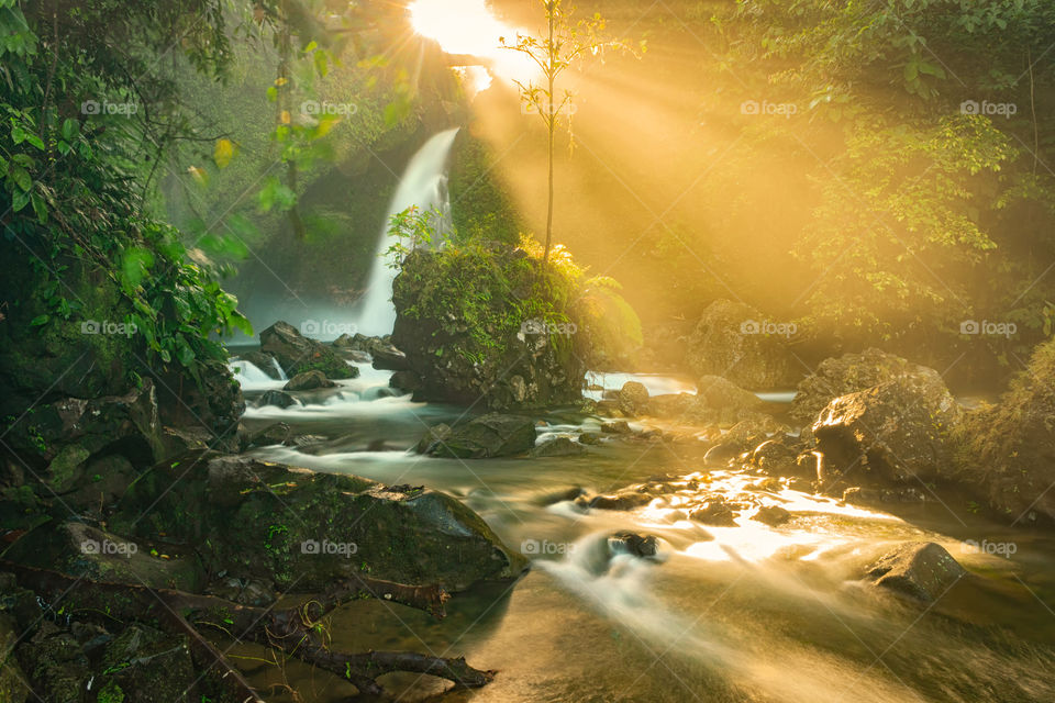 Waterfall with sun light