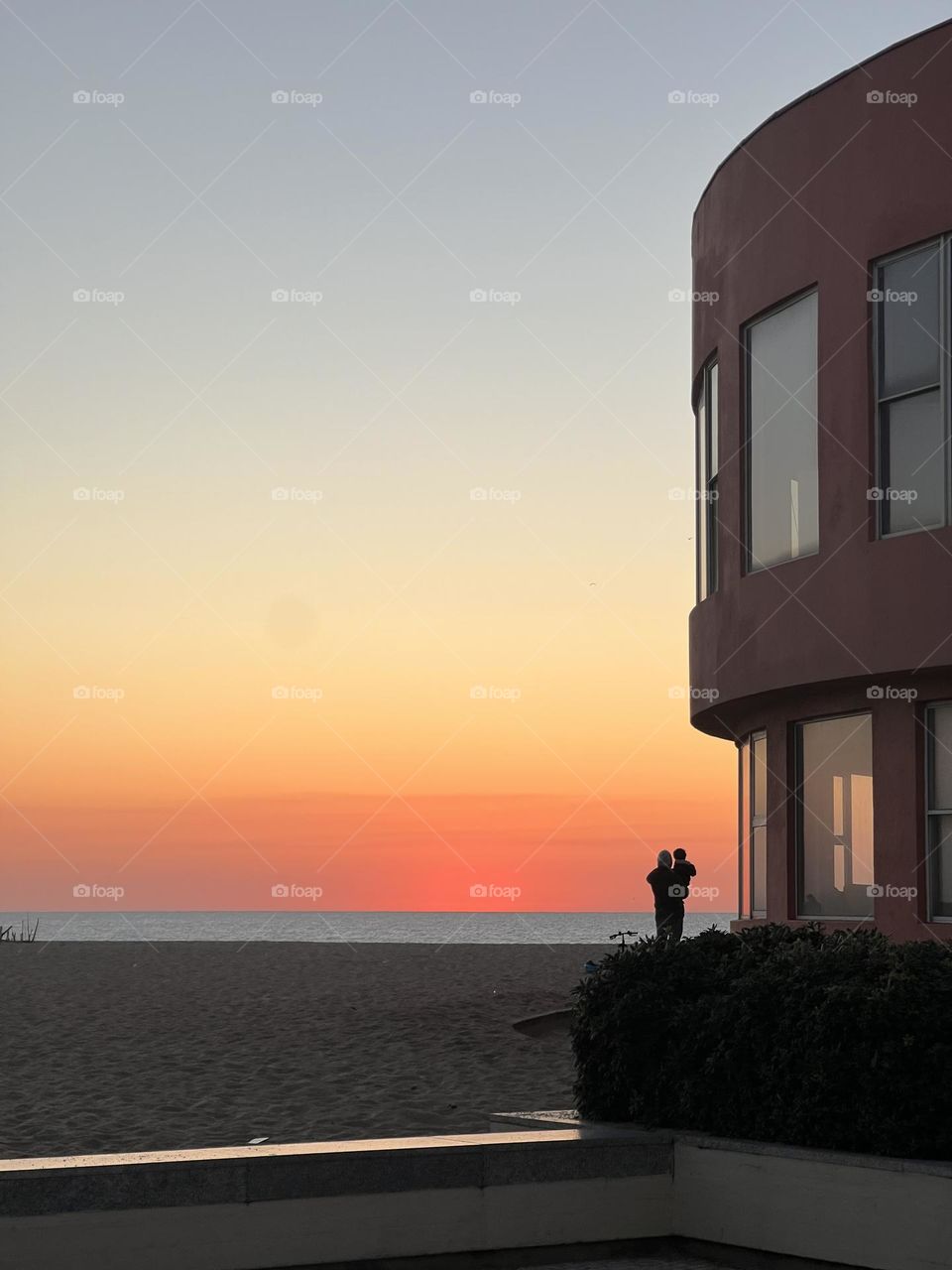 Father and son in the sunset