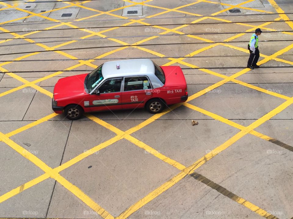 Taxi on yellow lines