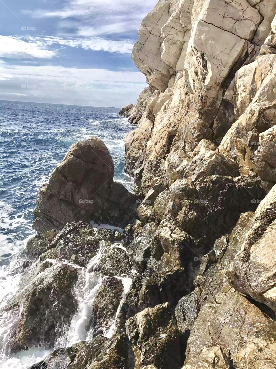 View of cliff with sea
