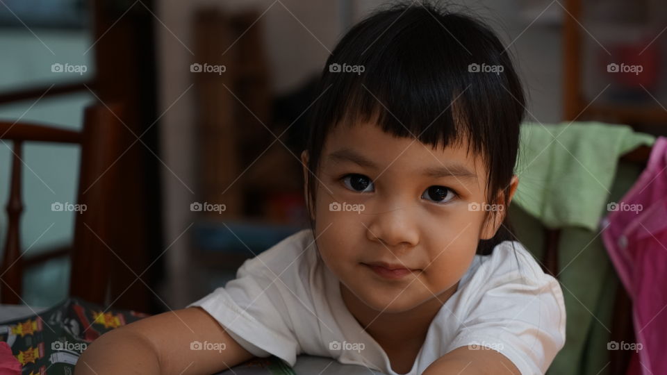 Asian girl on dinner table