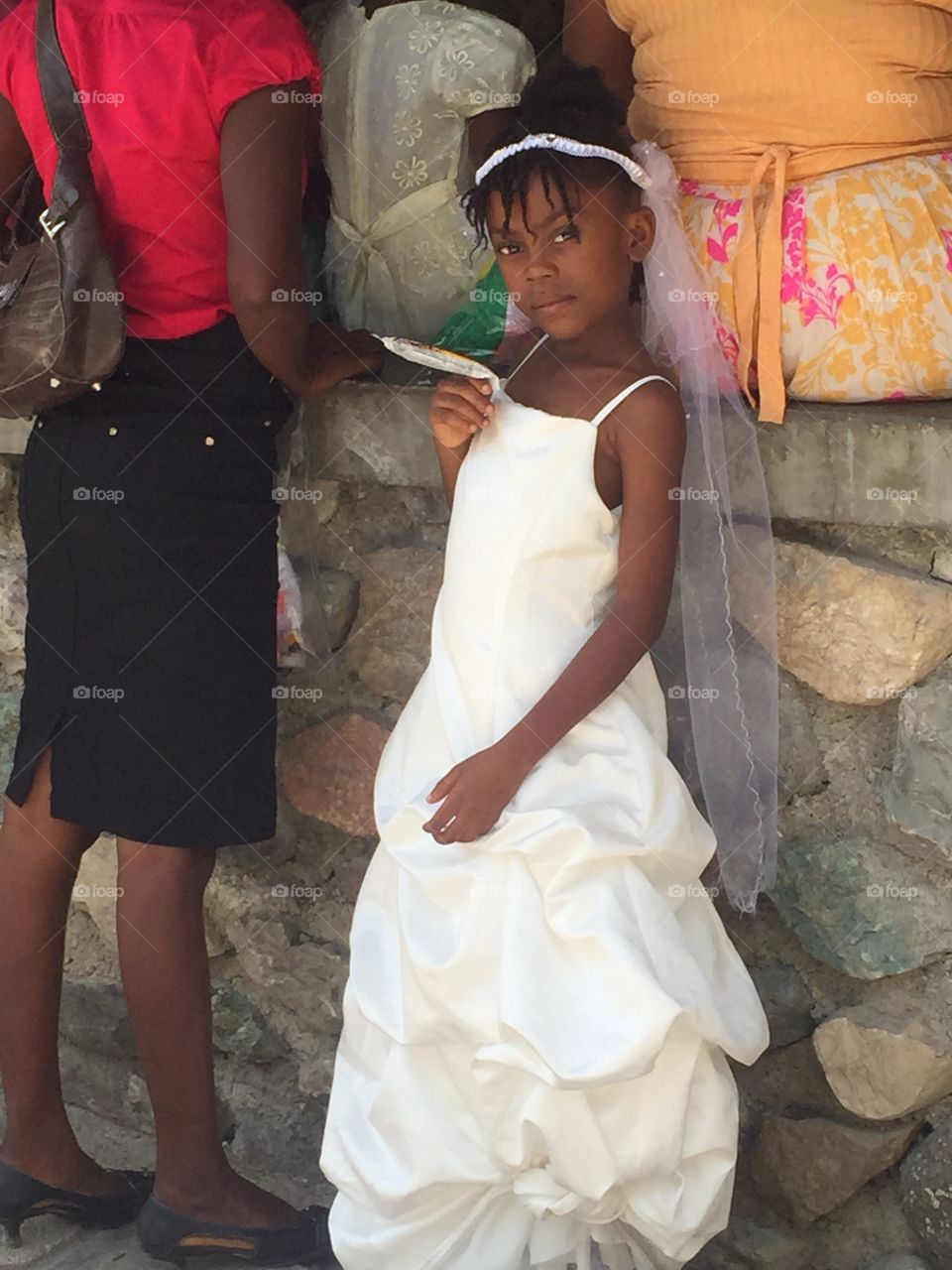 Young Haitian girl in white dress