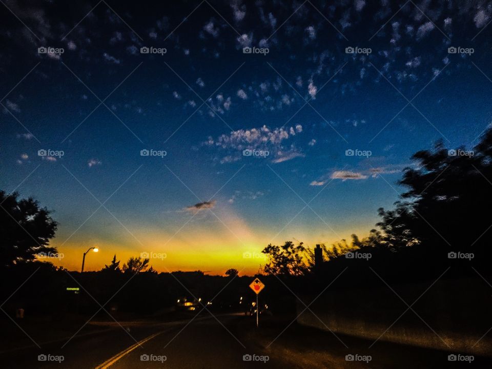 Sunset at the end of the road