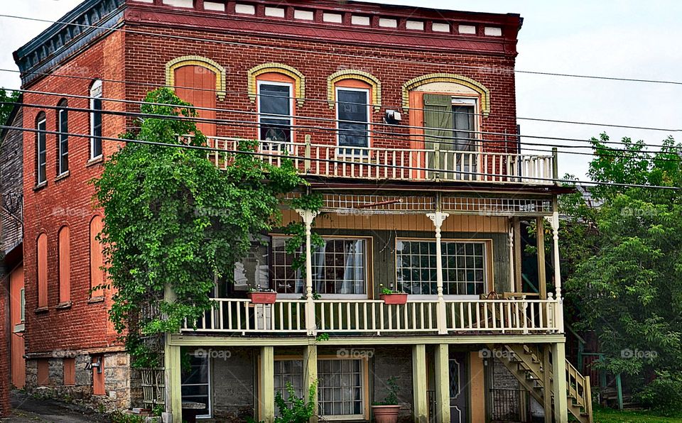 Old brick hotel converted. Old brick hotel converted to house