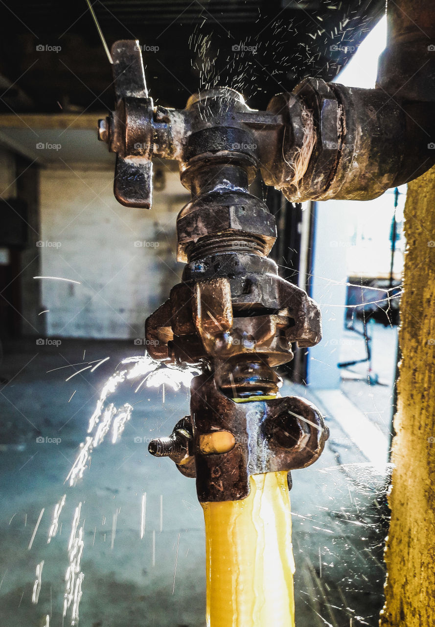 water leak light garden hose metal warehouse garage tap drop wet