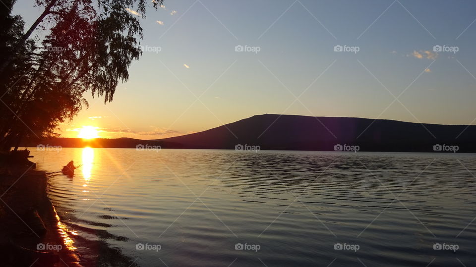 sunset in July on the Urals in Russia