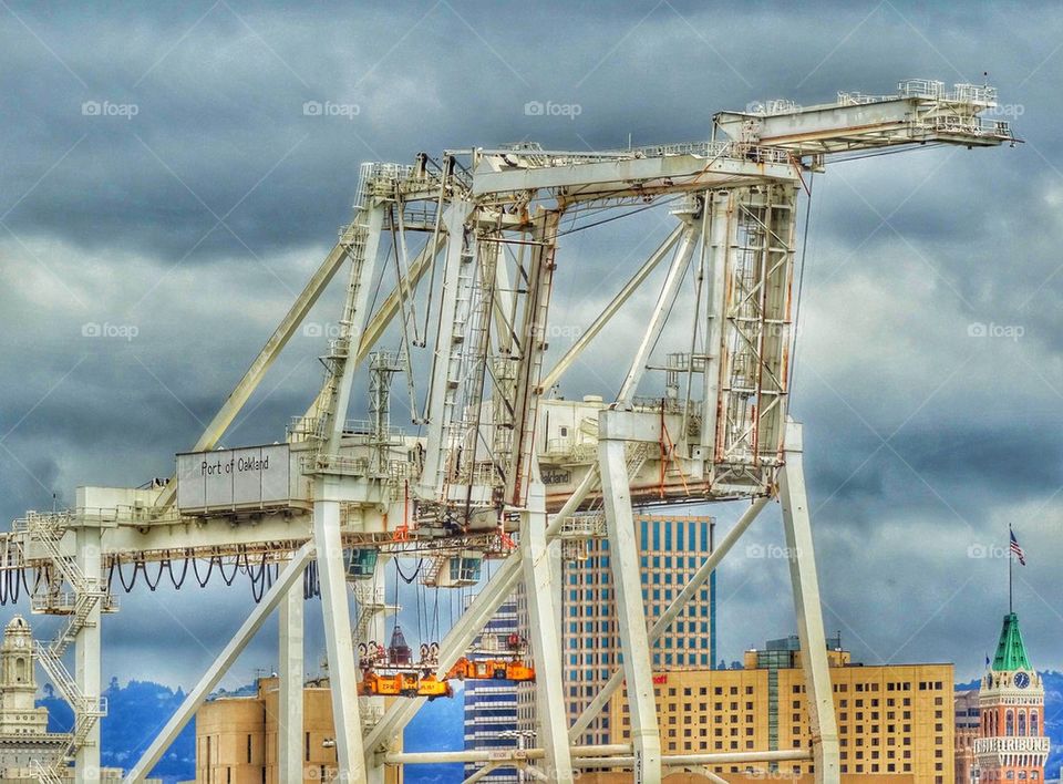 Massive Sea Port Cargo Cranes. Iconic Cargo Ship Loading Crane At The Oakland Seaport
