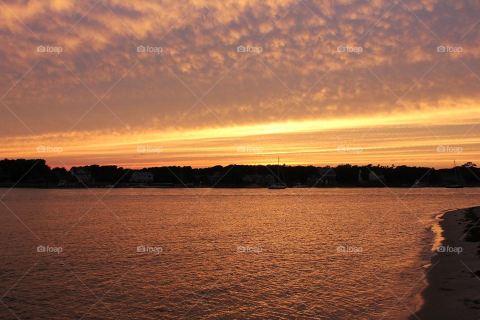 Streak of gold . Beautiful sunset over the Bass River, Cape Cod, Massachusetts - amazing sunsets mission 
