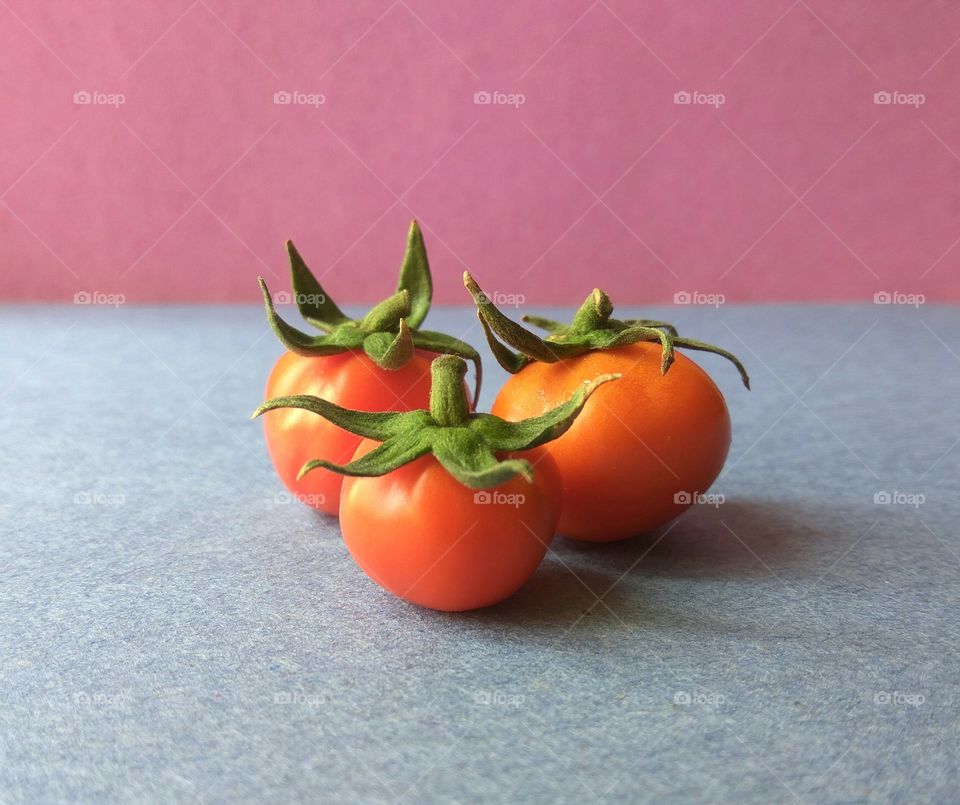 beautiful and cute image of small tomatoes found in Northern India.