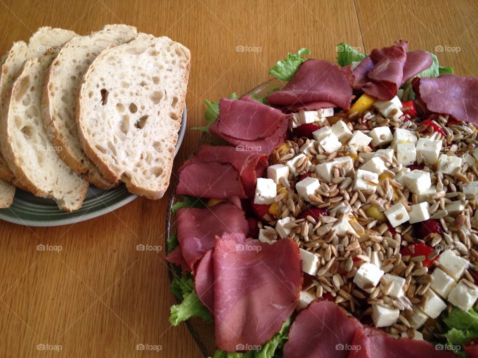 Salad with bread on a table