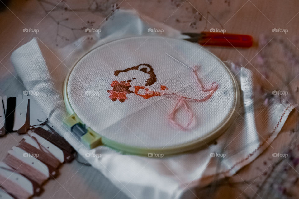 Cross stitching bear