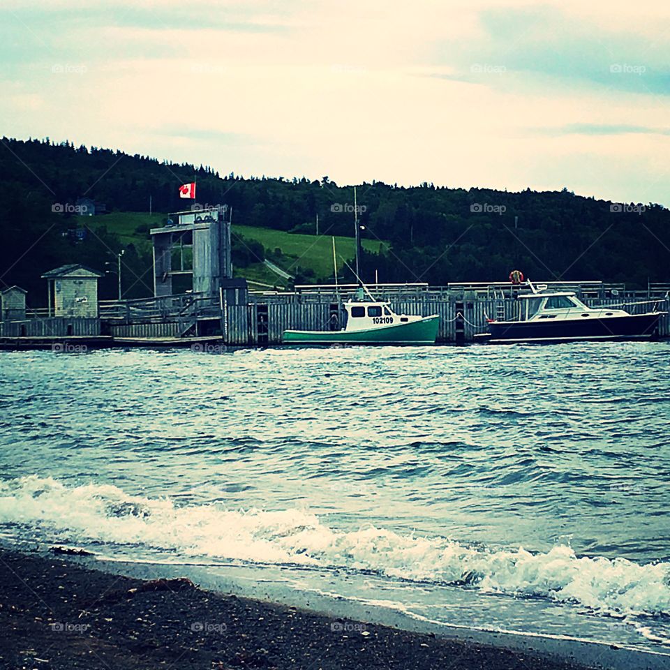 Marina with boats docked. Seaside in Canada. 