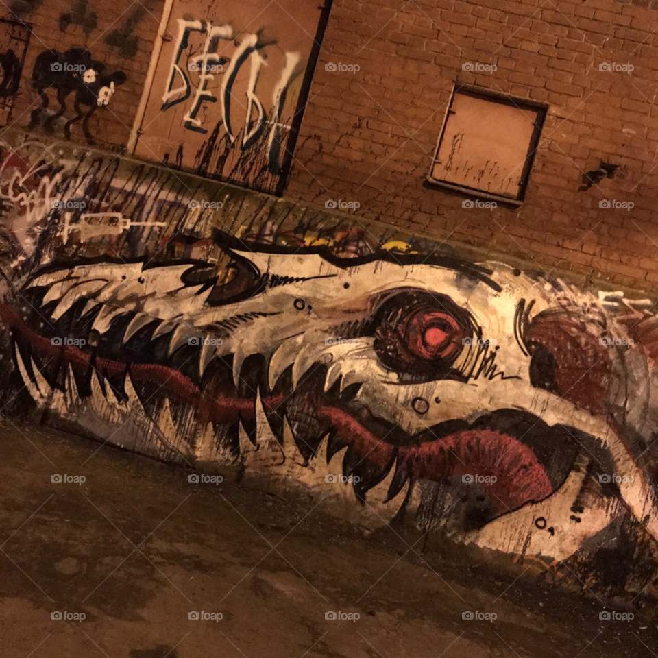 dead dragon head graffiti