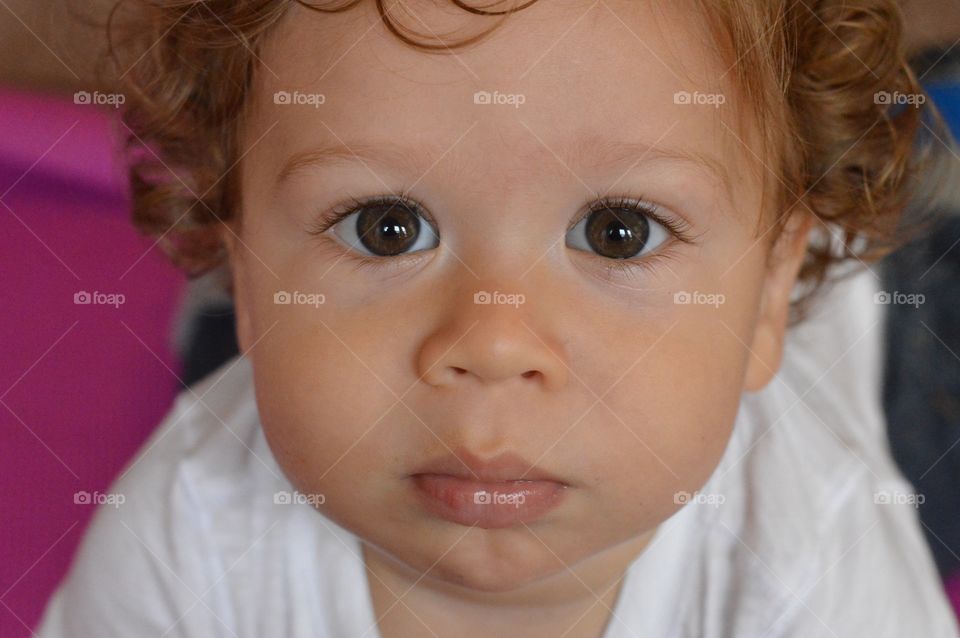 Close up of baby’s face.