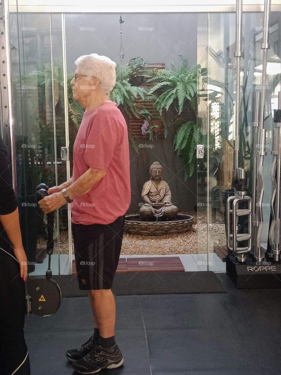 Elderly man at the gym