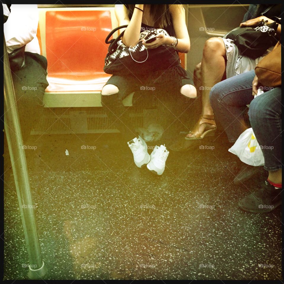 Subway & Jeans. Ripped jeans on a NY Subway