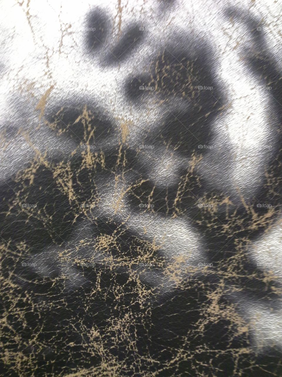 an interesting light pattern pressing down on a fabric