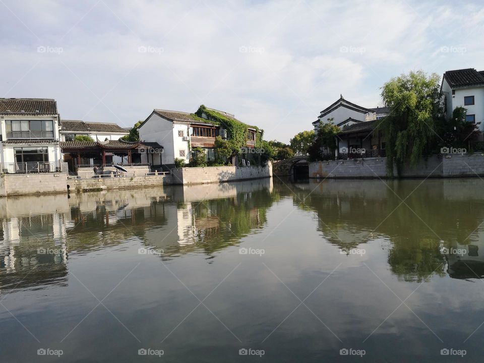 Serenity of Suzhou (Soochow), China. The city known as Venice of the east was built in 514 BC. It is characterized by its multitude of canals and classical gardens.