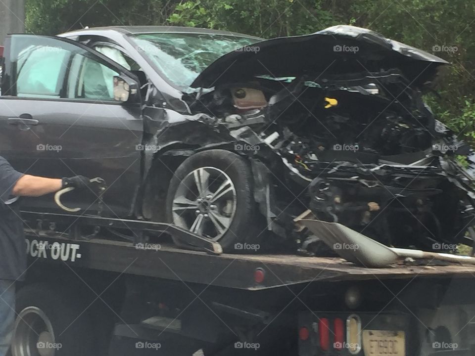 Black car damaged by accident