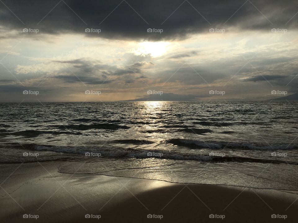 Scenic view of seascape and sunlight