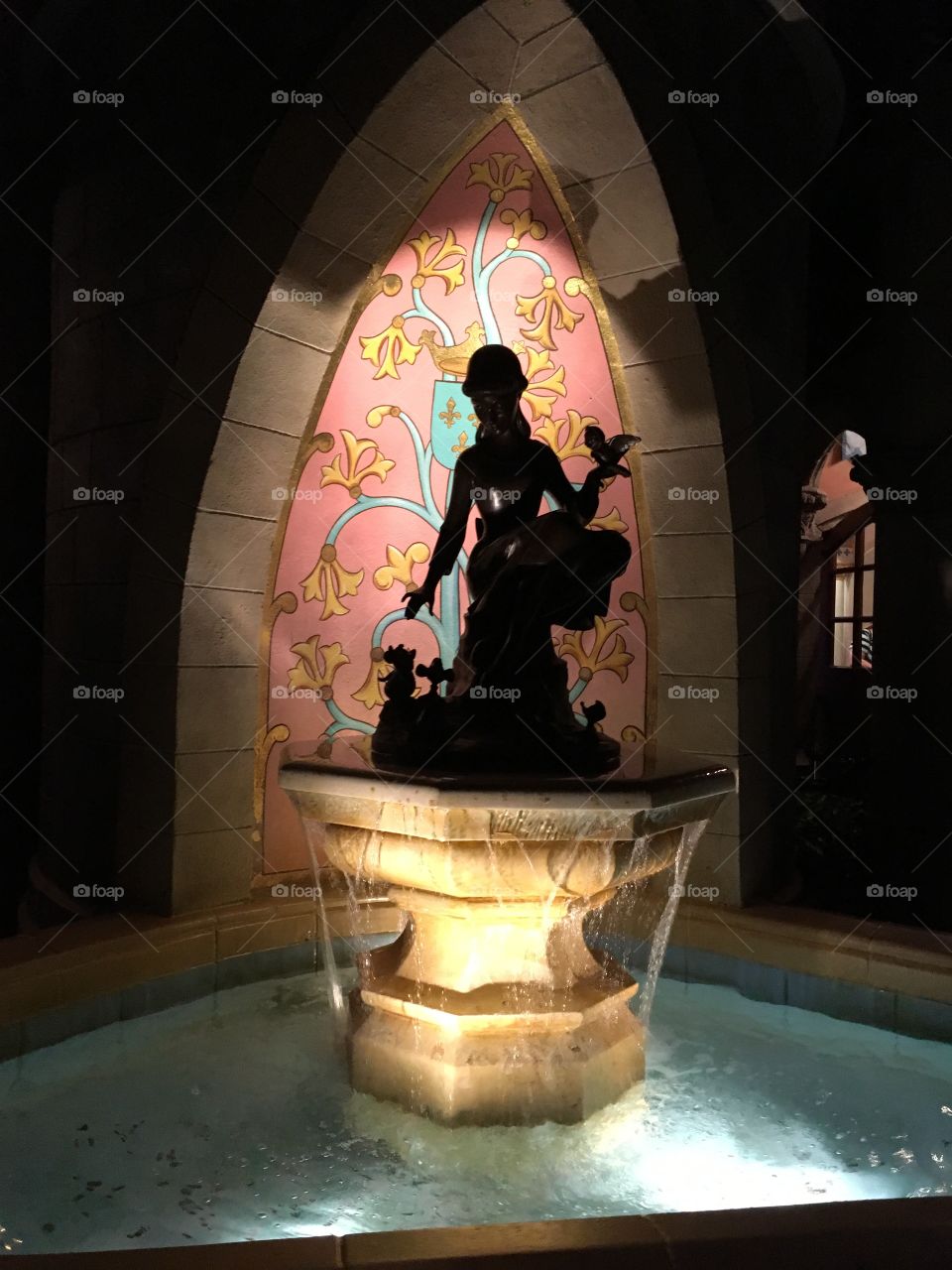 Maiden at a fountain or a princess? Look closely