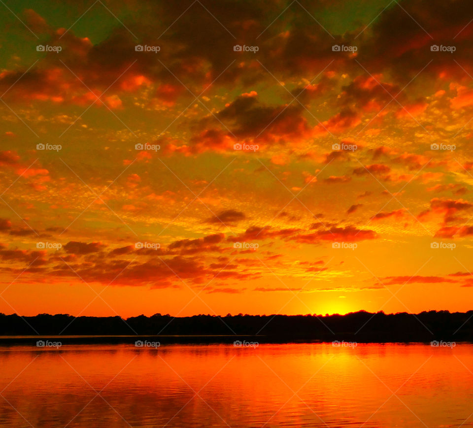 Dramatic sky reflected on lake