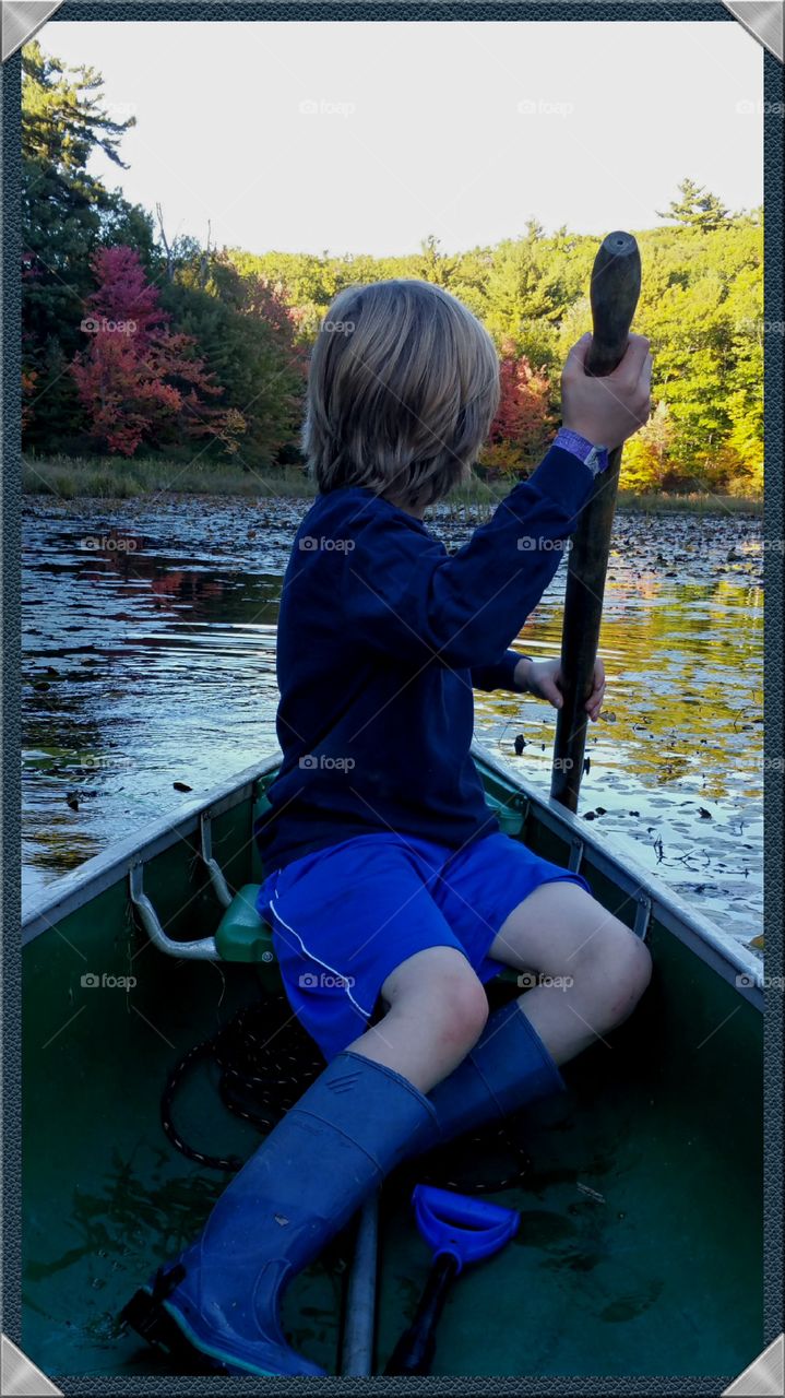 Boy in Canoe