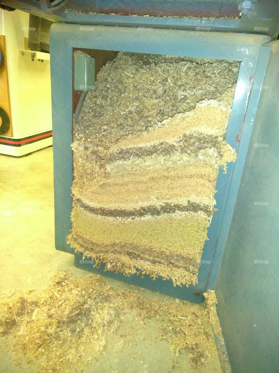 Wood shavings collected in tablesaw over a year of usage.