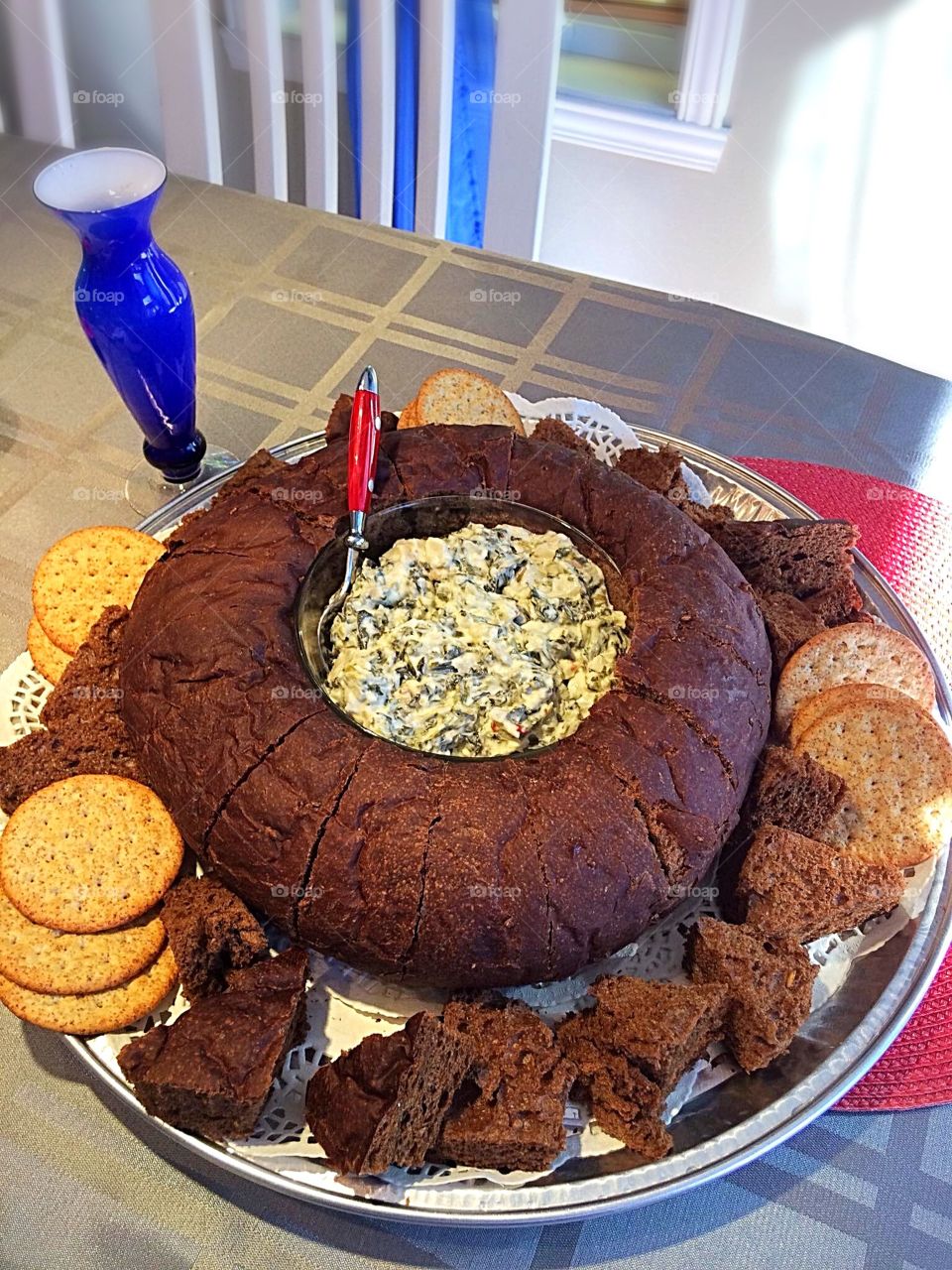 Spinach dip, pumpernickel bread 