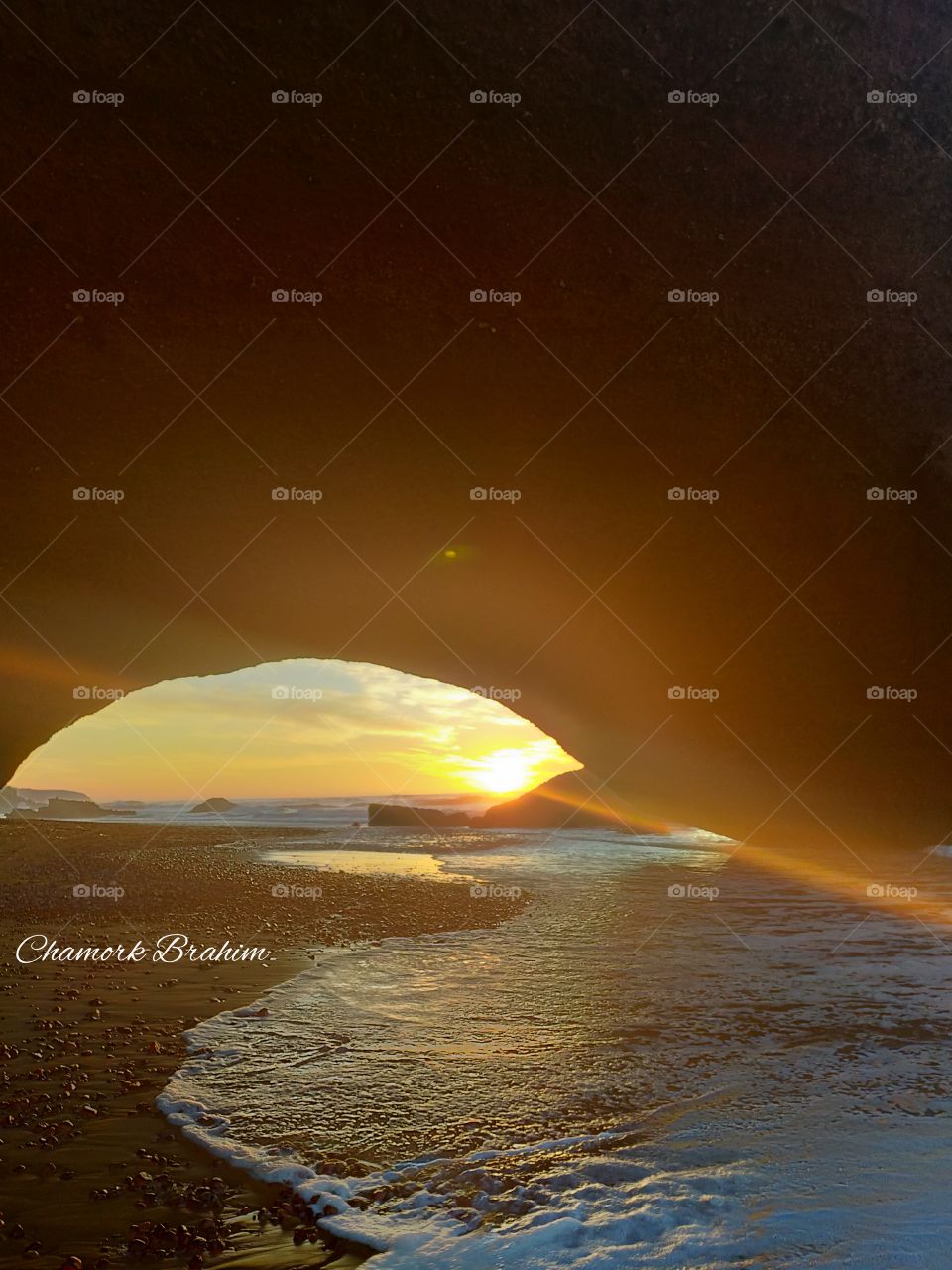 An amazing sunset below an arch in the region of Ifni,Morocco...great moments near it