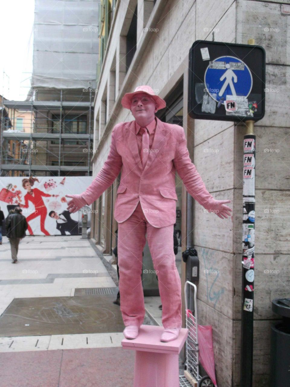 Imitator in pink in the street