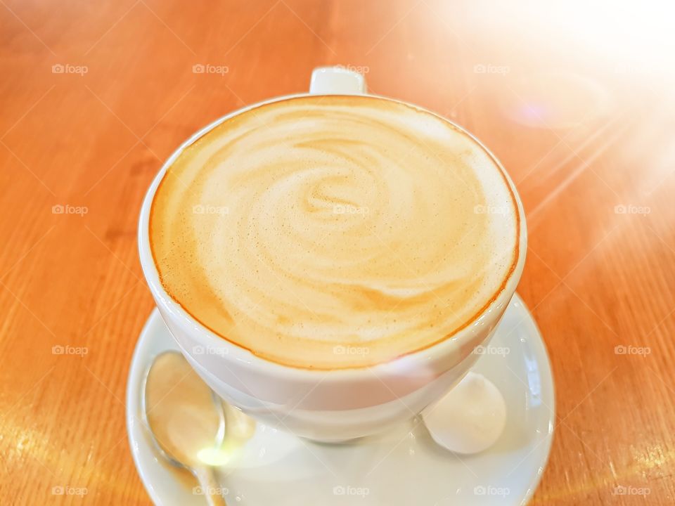 Cup with cappuccino.