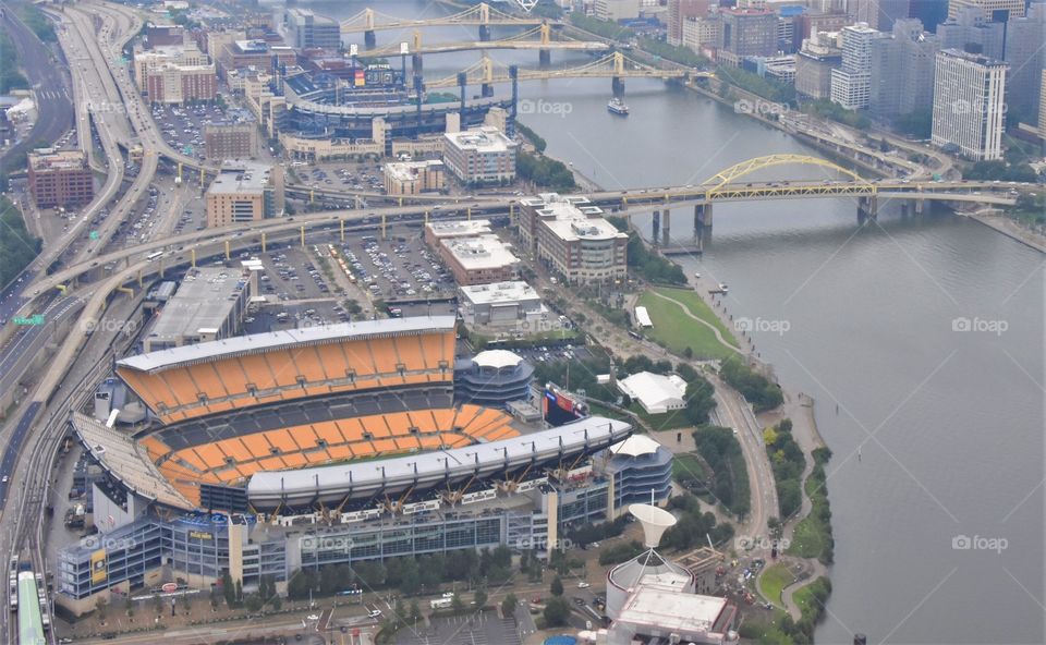 Heinz Field, Pittsburgh PA, aerial view including some of the bridges and the river