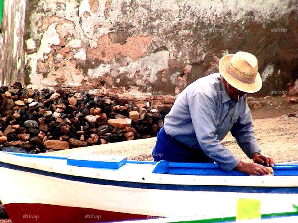 beach man boat work by merethe