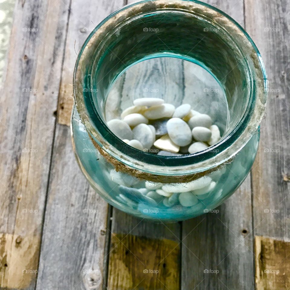 Wood with Jar of Rocks