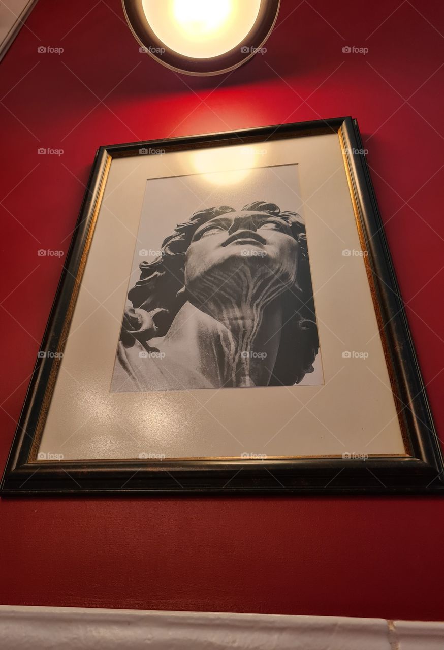 portrait on the red wall