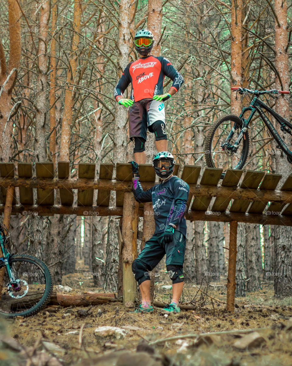 Mtb riders possing in the forest track