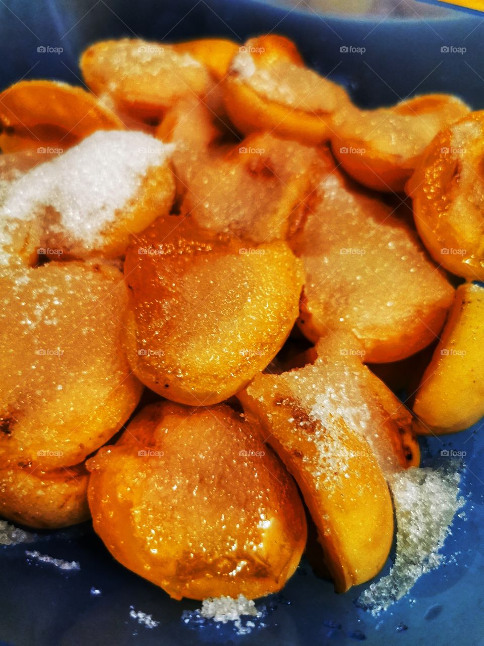 Sweet home indoor food yummy served table day part yellow form circle ellipce tasty apricot jam