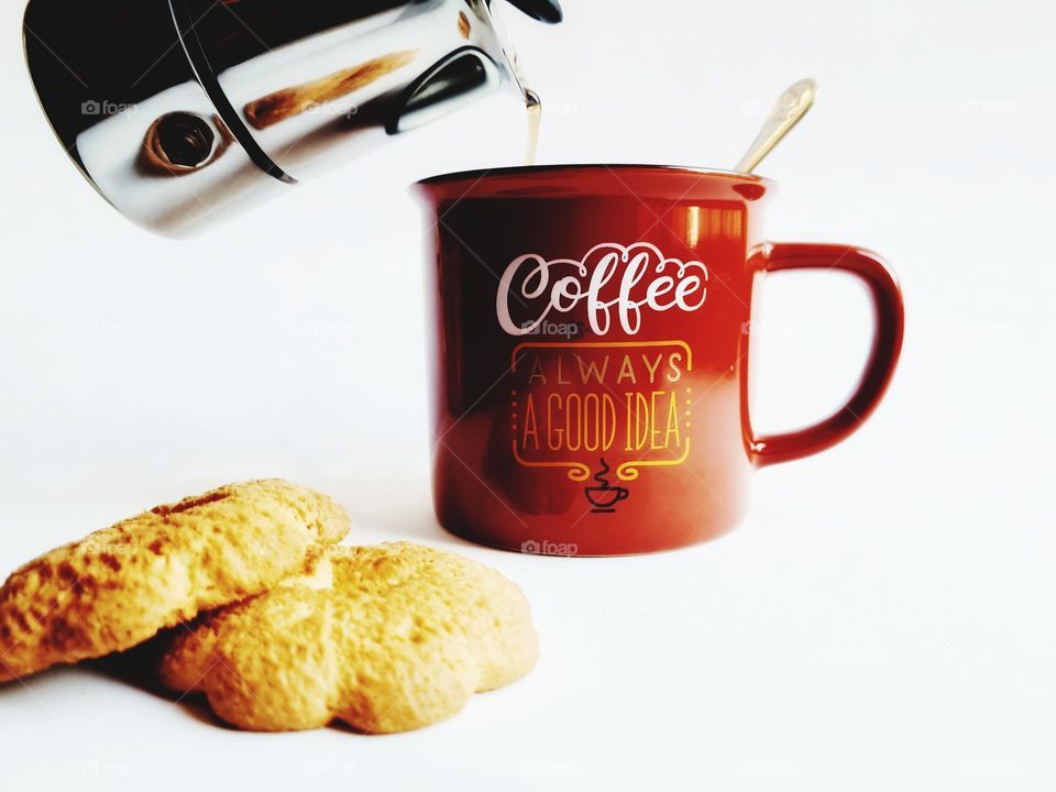 Italian mocha pours coffee into a cup