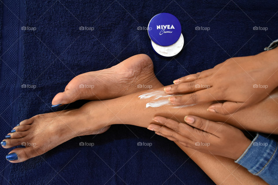 applying nivea cream