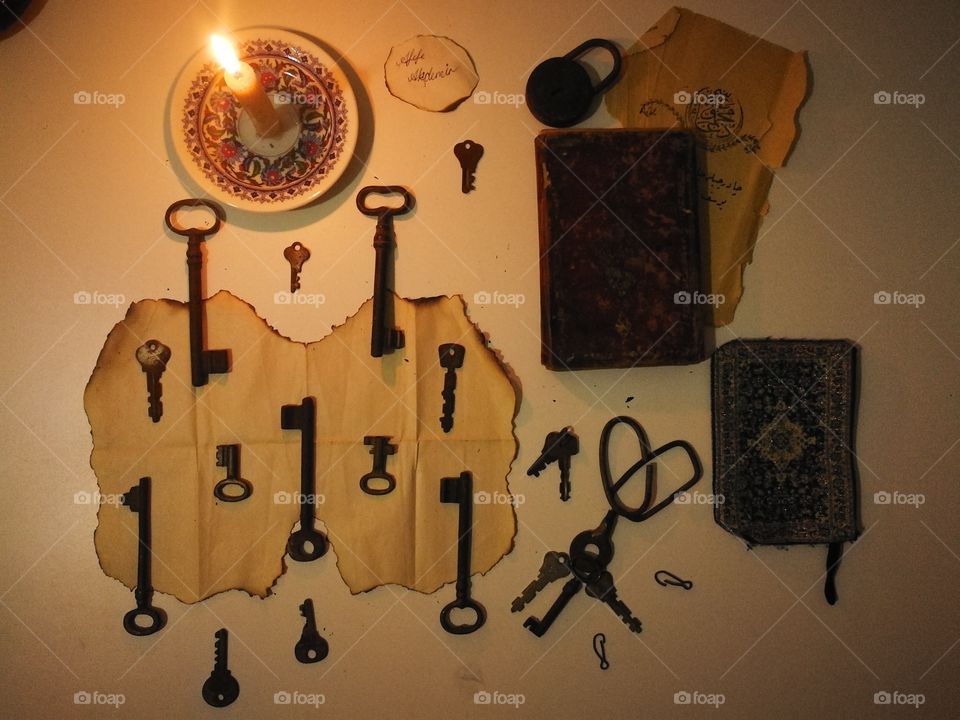 my lovely key collection and old book with candle