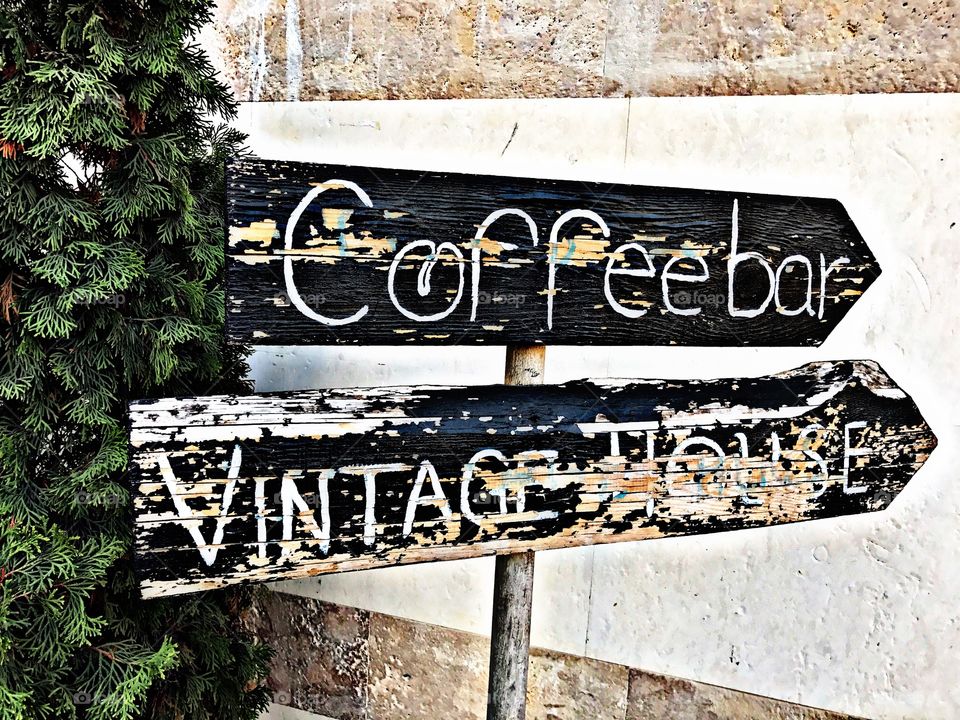 Close-up of coffee bar sign board