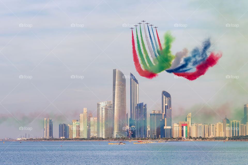 Seven planes flying across Abu Dhabi corniche