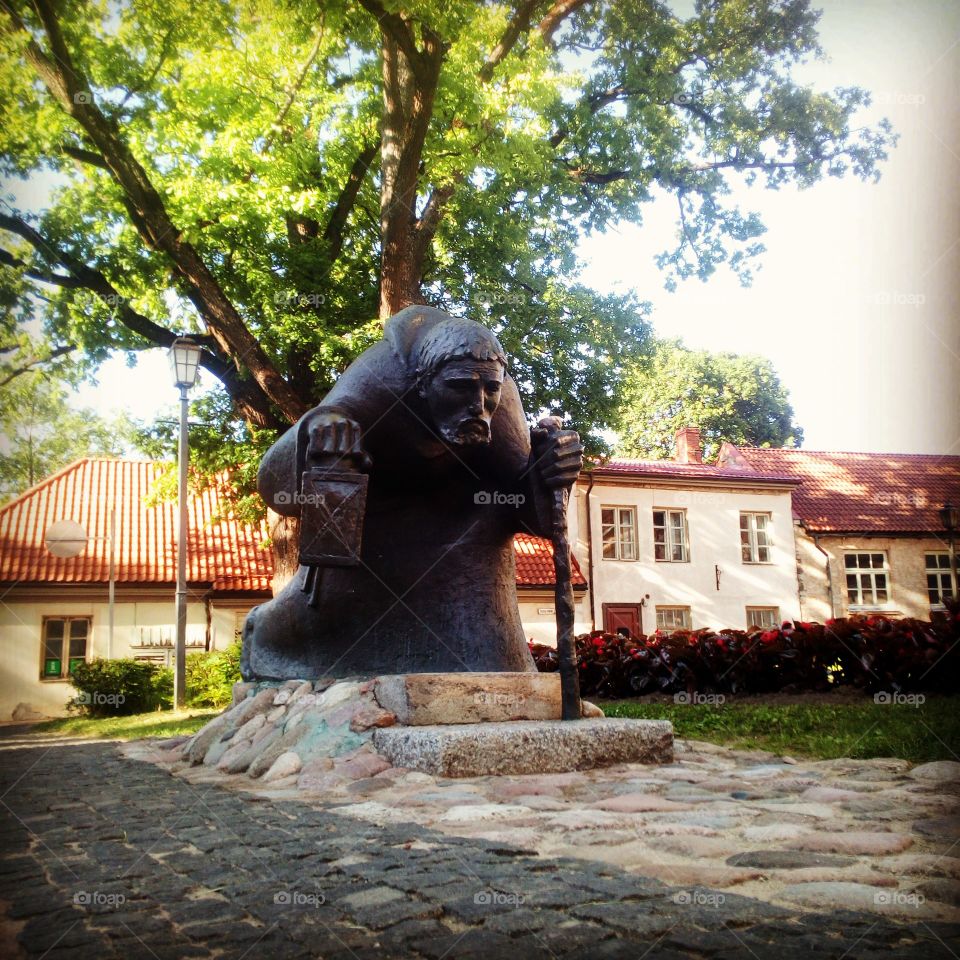 Matthias Janson sculpture "Through the centuries", popularly known as Old Time man) was opened in July 2005. It depicts a man with a lamp - symbol of the town of Cēsis. The sculpture is located near St.John's church, on Torņu street.