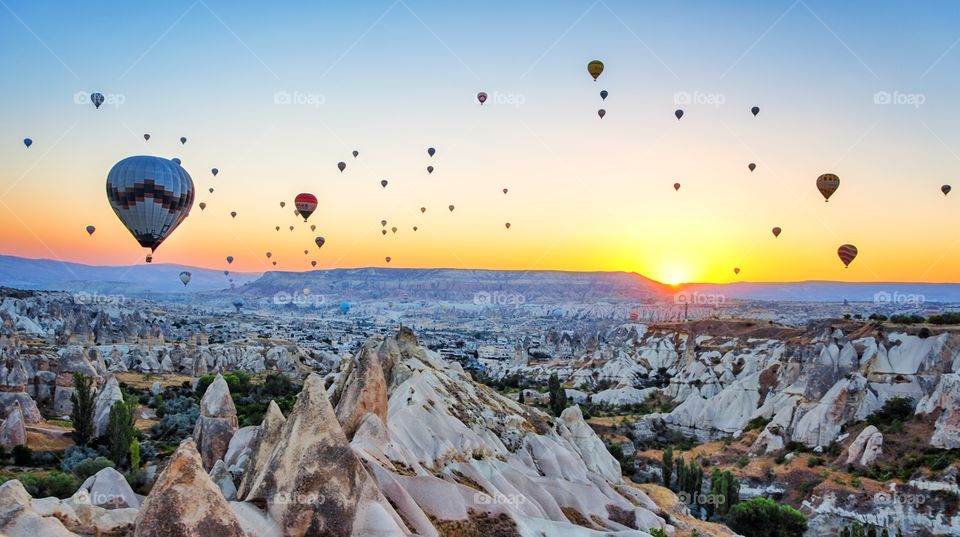 hot air balloons at sunrise in cappadocia